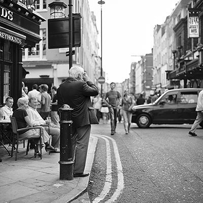 Taking picture | Black and White Street Photo