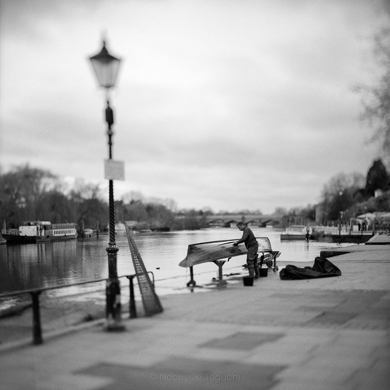 Working on a boat | Black and white film photo