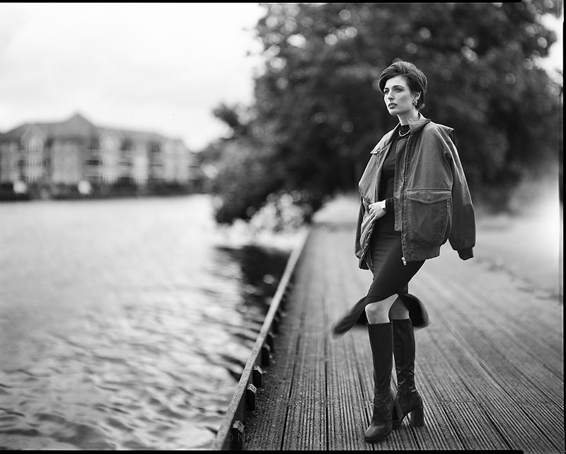 Portrait woman standing at River Thames